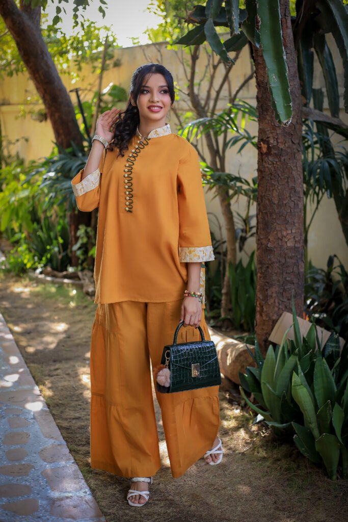 Woman in a rust co-ord set outdoors