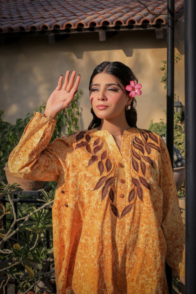 Model in hand-printed outfit